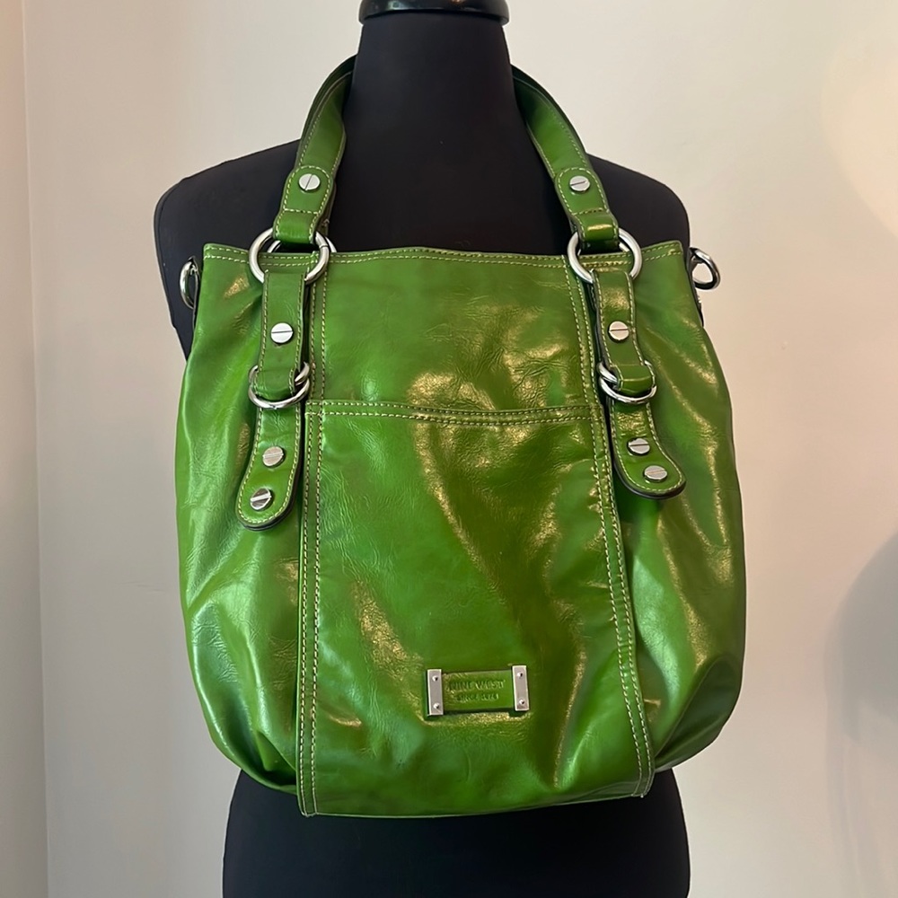 Green leather Nine West Purse with unique colour leopard lining inside.